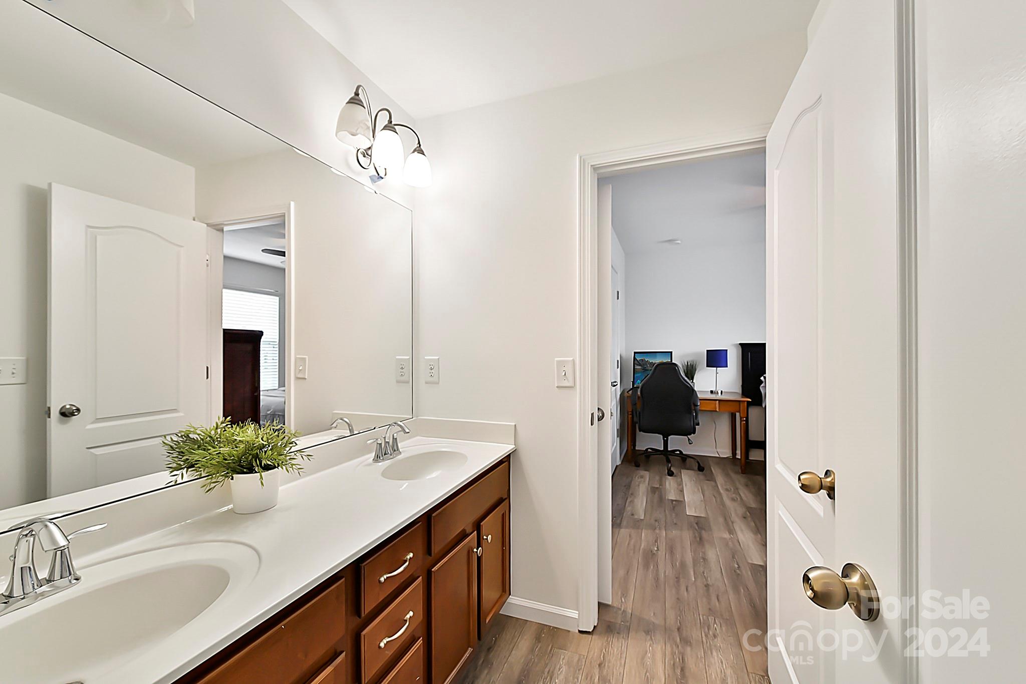 1201 Screech Owl Road Waxhaw, NC 28173 - Photo 29 of 43 a en suite bathroom with a sink double vanity