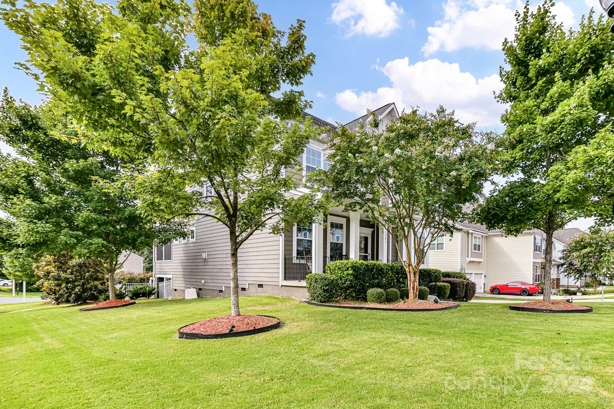 1201 Screech Owl Road Waxhaw, NC 28173 - Photo 3 of 43 a swimming pool with trees in front of it