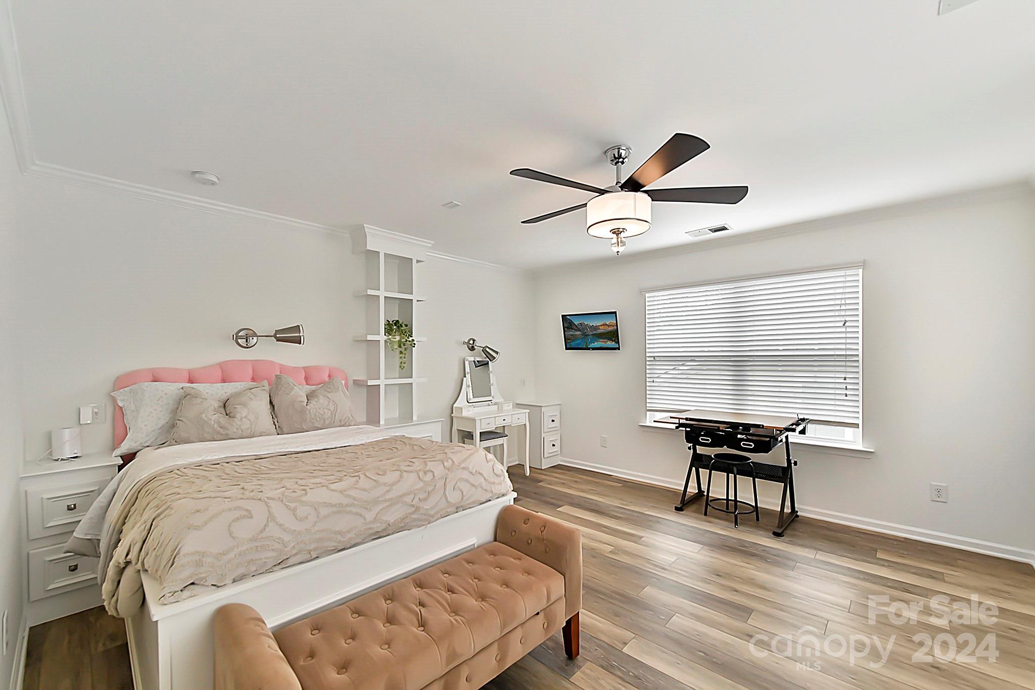 1201 Screech Owl Road Waxhaw, NC 28173 - Photo 34 of 43 a bedroom with a bed and a desk