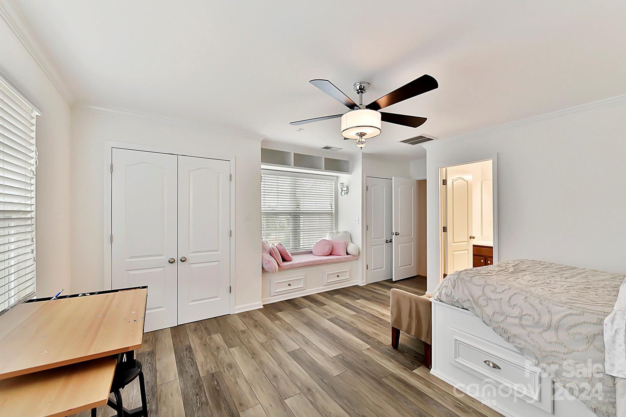 1201 Screech Owl Road Waxhaw, NC 28173 - Photo 35 of 43 a living room with stainless steel appliances kitchen island hardwood floor and a window