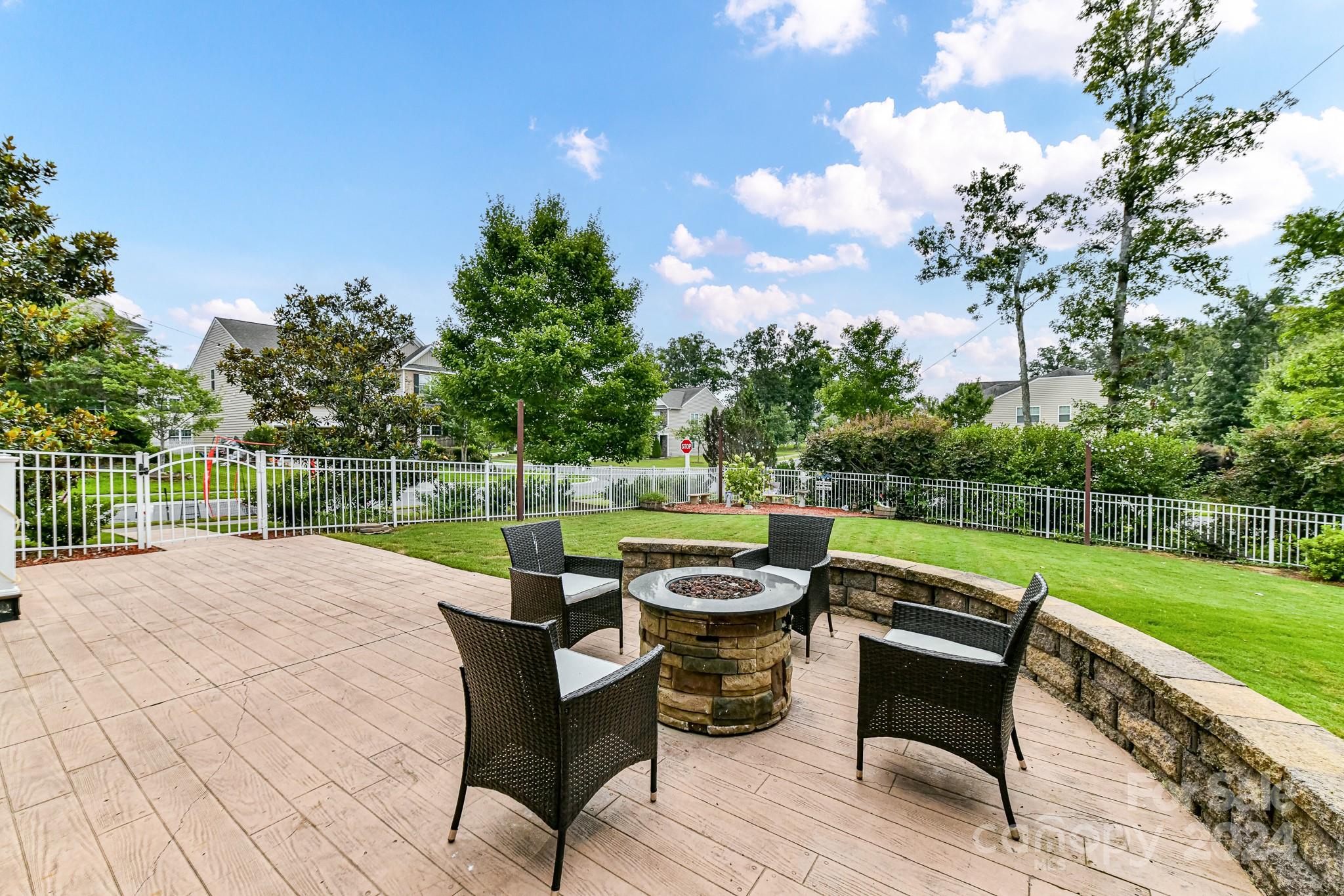 1201 Screech Owl Road Waxhaw, NC 28173 - Photo 41 of 43 a view of a chairs and table on the terrace