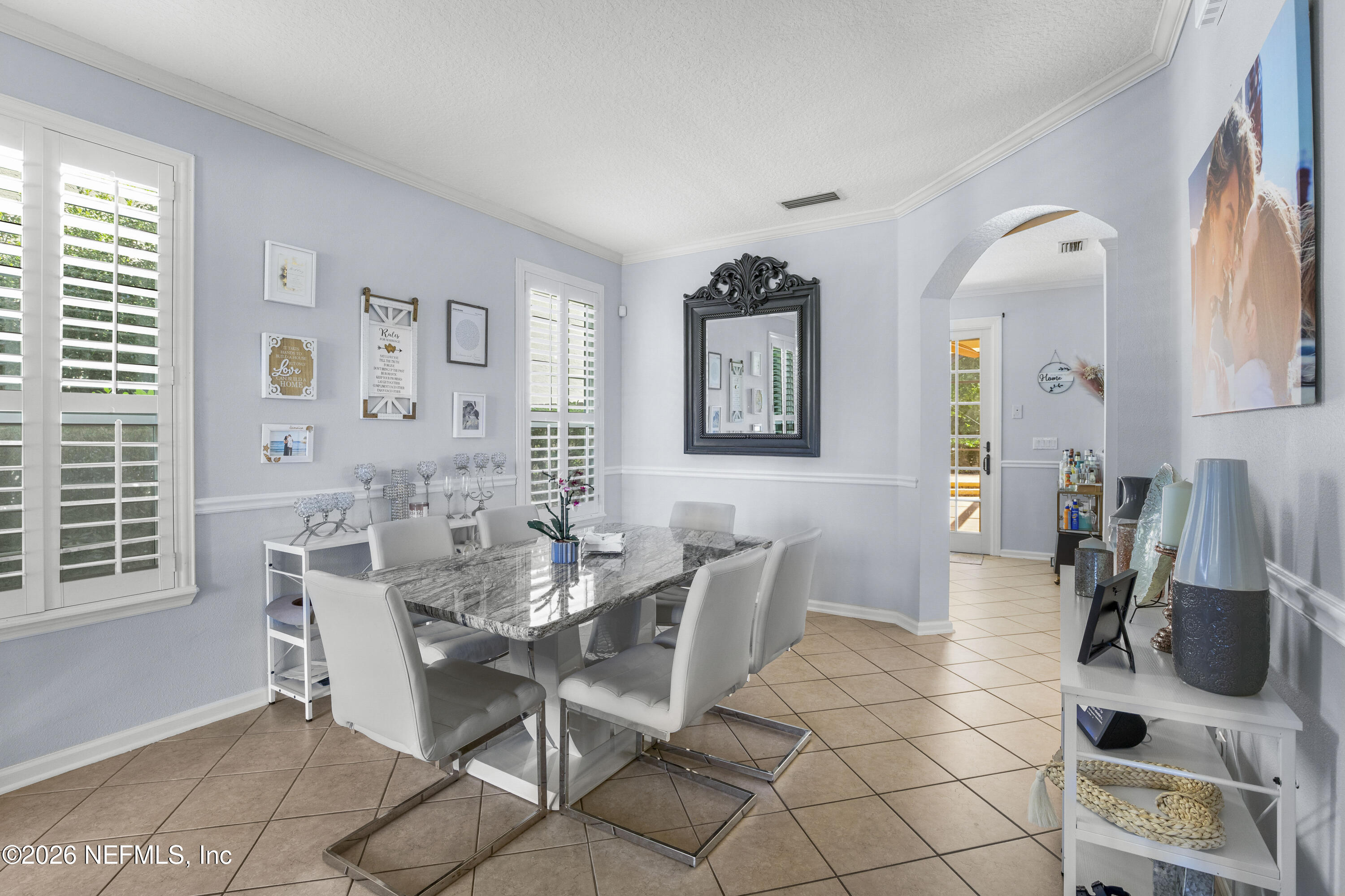 3020 South Atherley Road St. Augustine, FL 32092 - Photo 13 of 61 a dining room with furniture and window