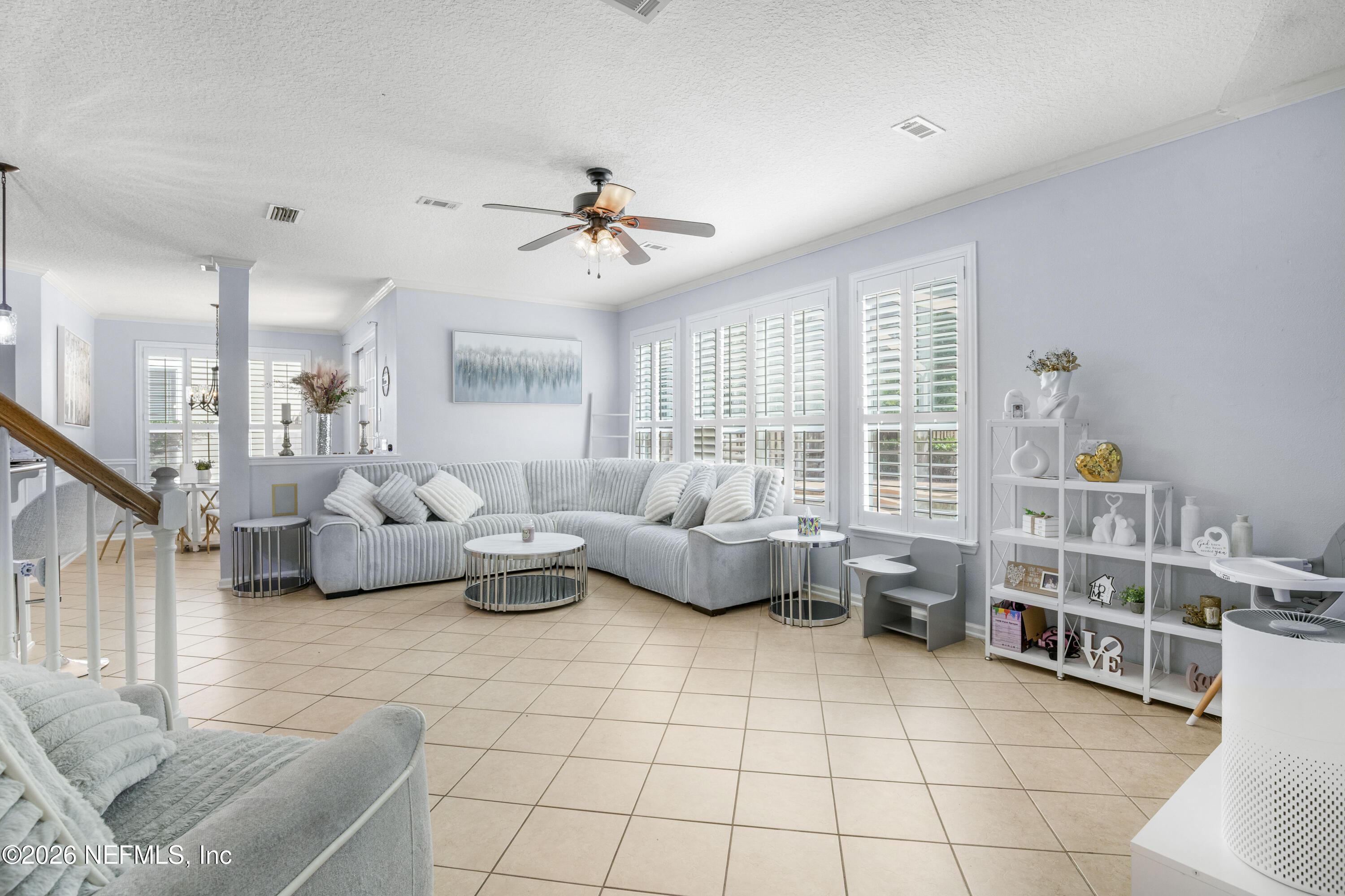 3020 South Atherley Road St. Augustine, FL 32092 - Photo 3 of 61 a living room with furniture and a flat screen tv