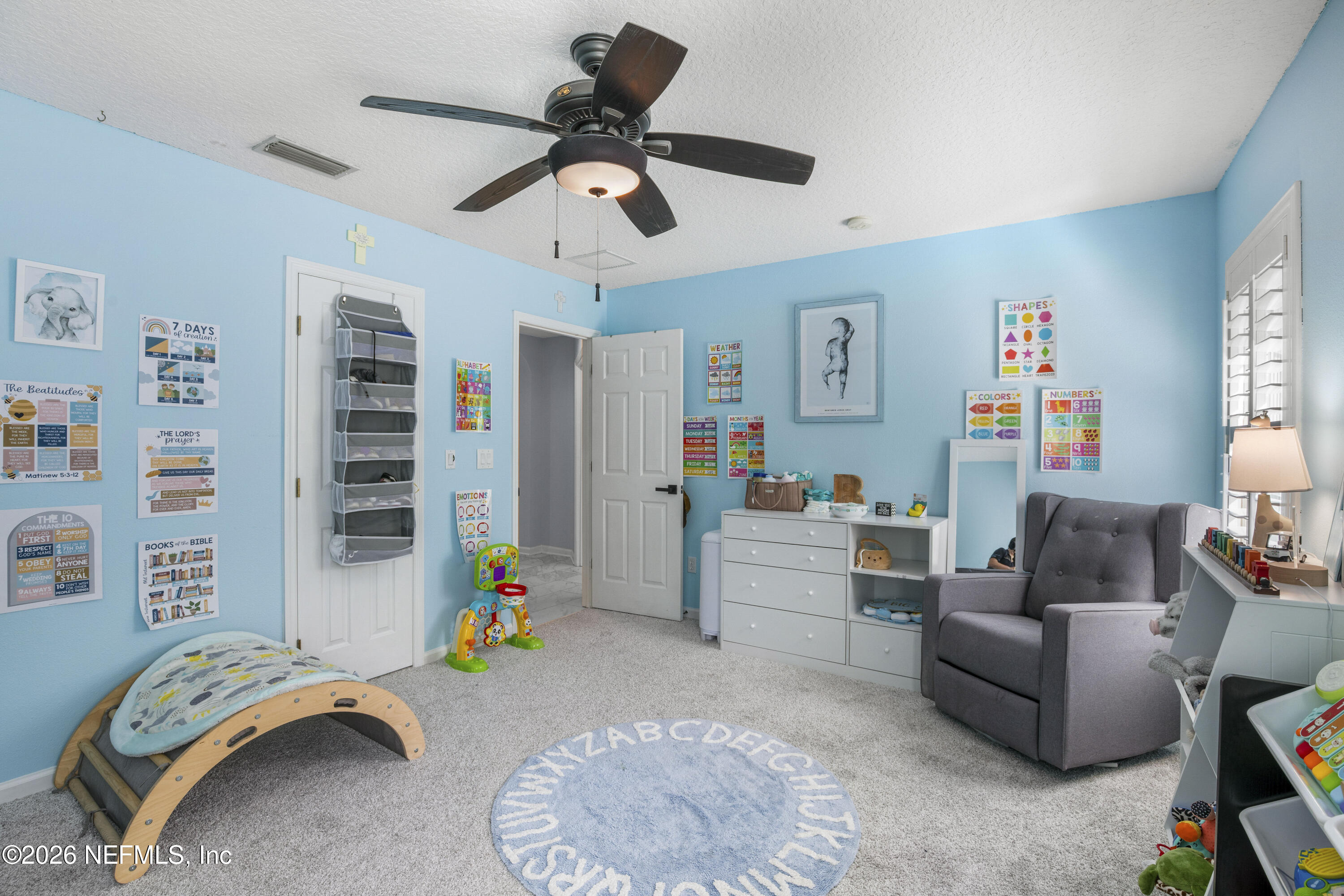 3020 South Atherley Road St. Augustine, FL 32092 - Photo 45 of 61 a living room with furniture and a couch