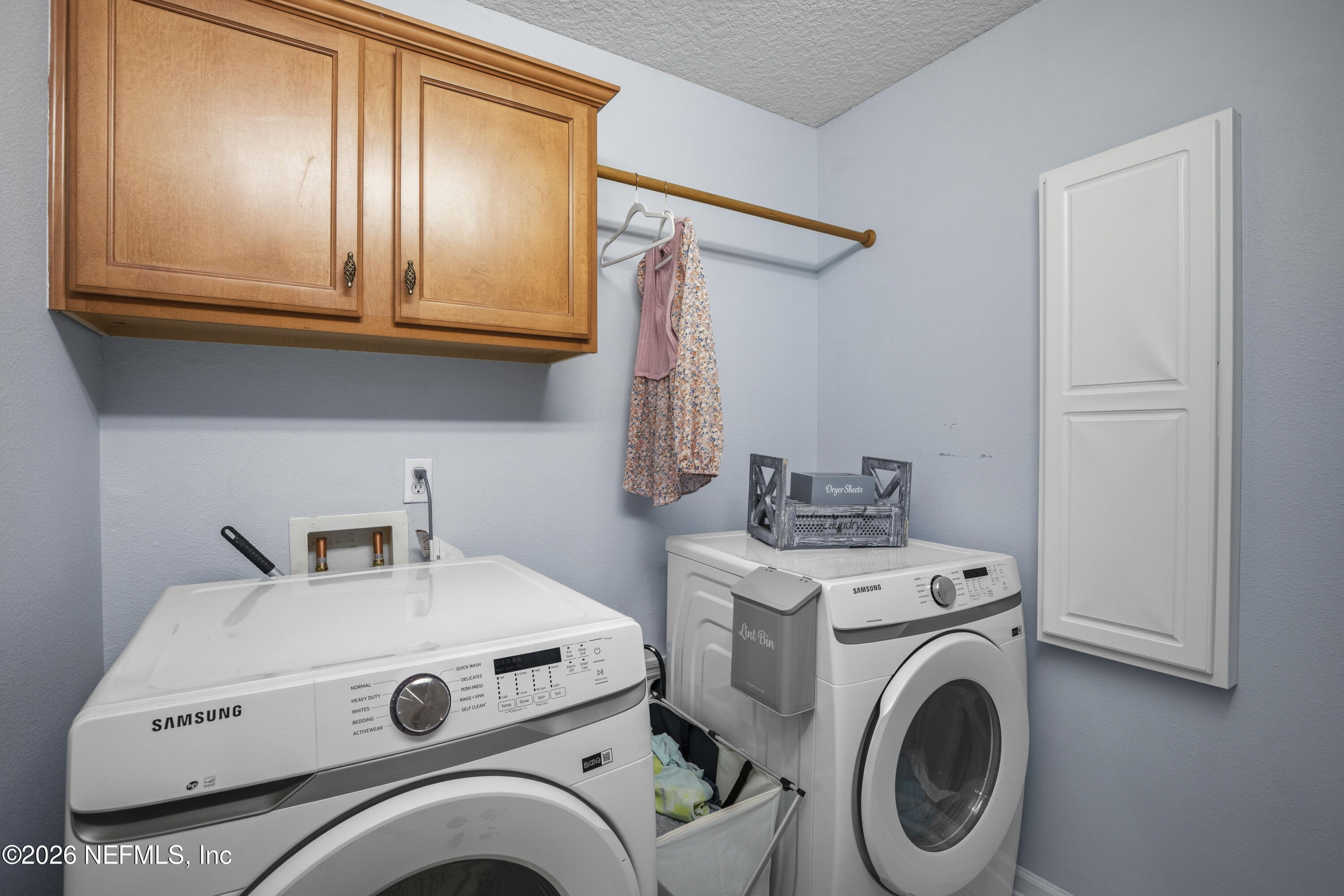 3020 South Atherley Road St. Augustine, FL 32092 - Photo 47 of 61 a utility room with dryer and washer