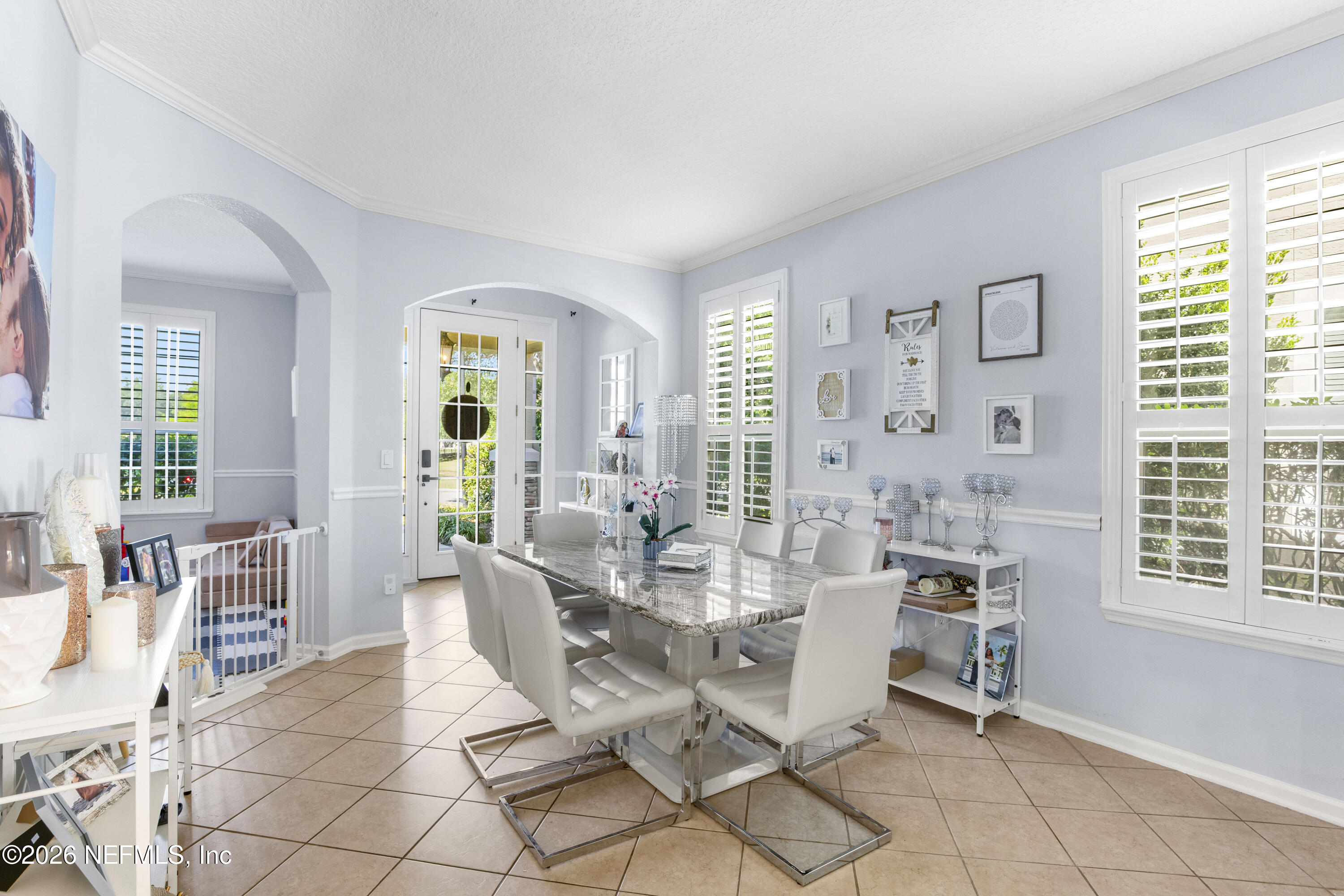 3020 South Atherley Road St. Augustine, FL 32092 - Photo 5 of 61 a view of a dining room with furniture and windows