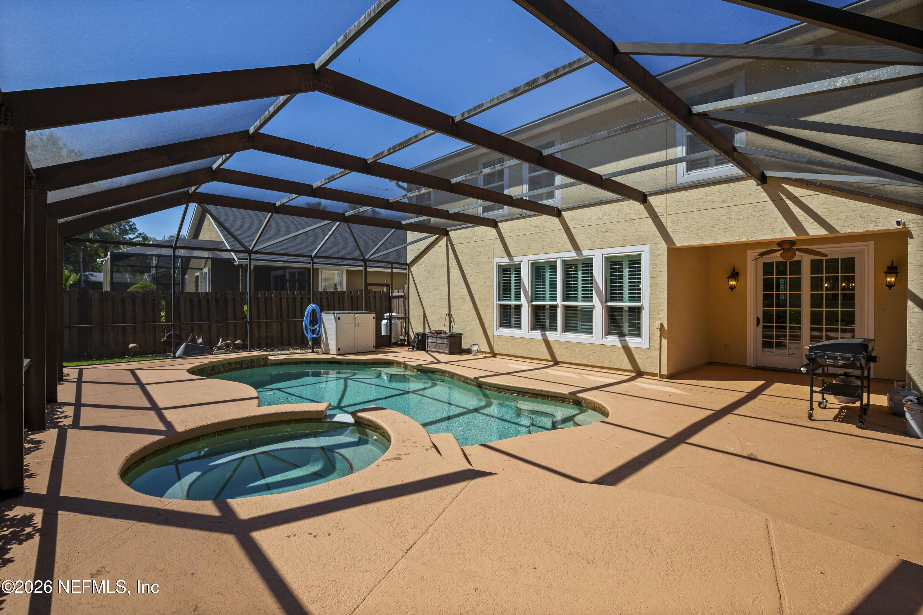 3020 South Atherley Road St. Augustine, FL 32092 - Photo 51 of 61 a view of a house with backyard sitting area and porch