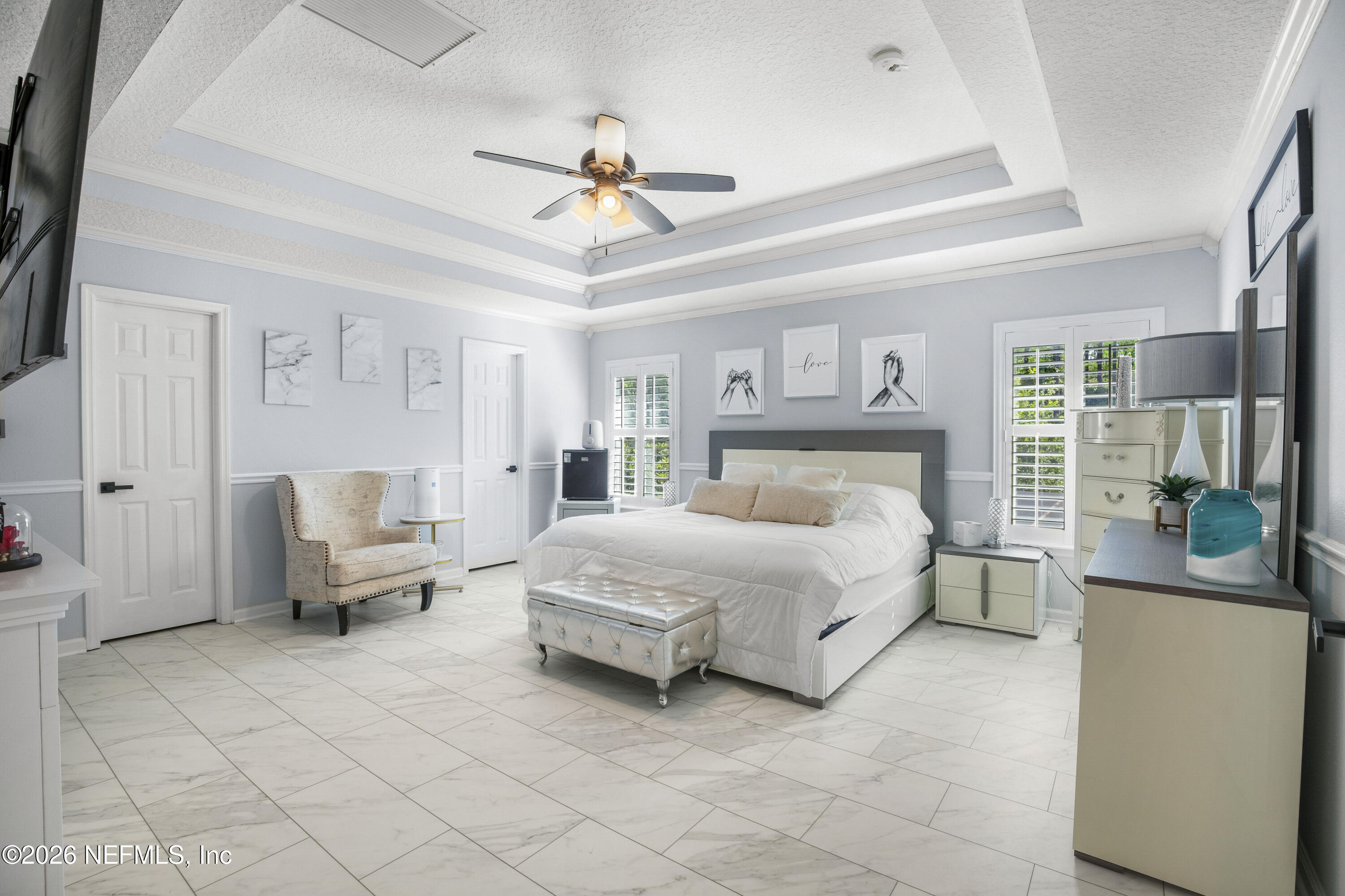 3020 South Atherley Road St. Augustine, FL 32092 - Photo 6 of 61 a spacious bedroom with a bed and furniture