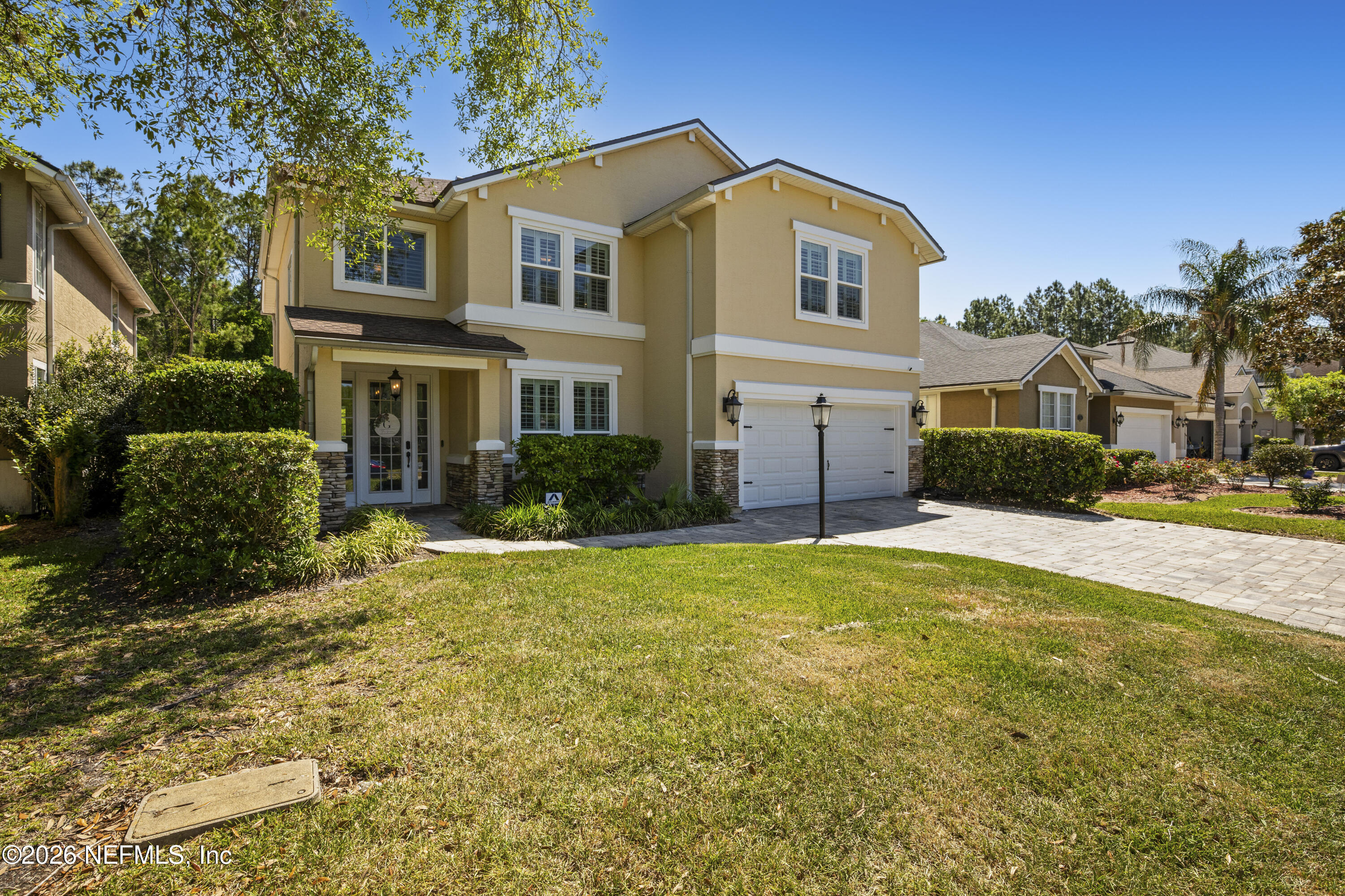 3020 South Atherley Road St. Augustine, FL 32092 - Photo 61 of 61 a front view of a house with a yard