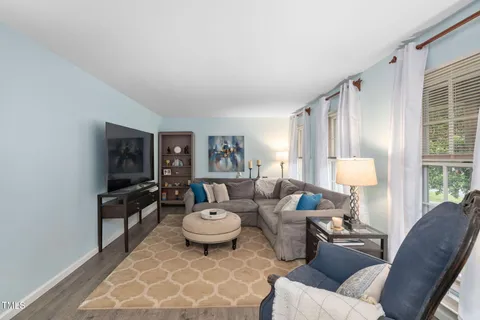 a living room with furniture and a couch