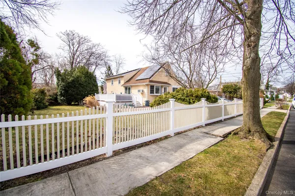 a view of a wrought iron fences in front of house