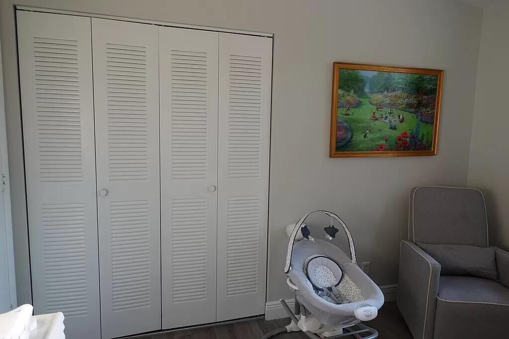 11720 Timbers Way Boca Raton, FL 33428 - Photo 14 of 19 a view of a hallway with elevator