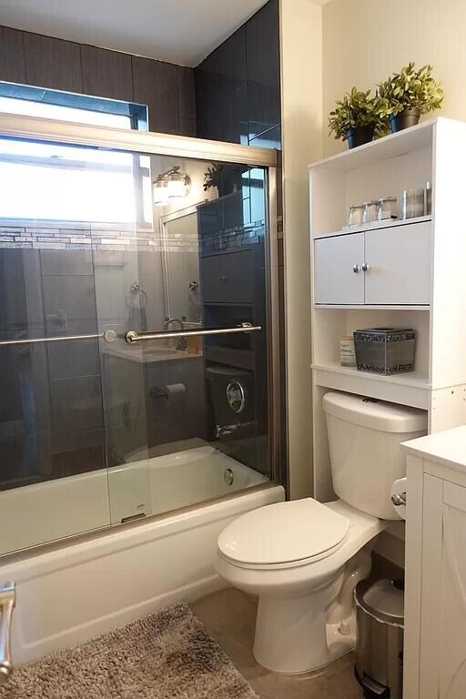 11720 Timbers Way Boca Raton, FL 33428 - Photo 15 of 19 a bathroom with a toilet and a shower