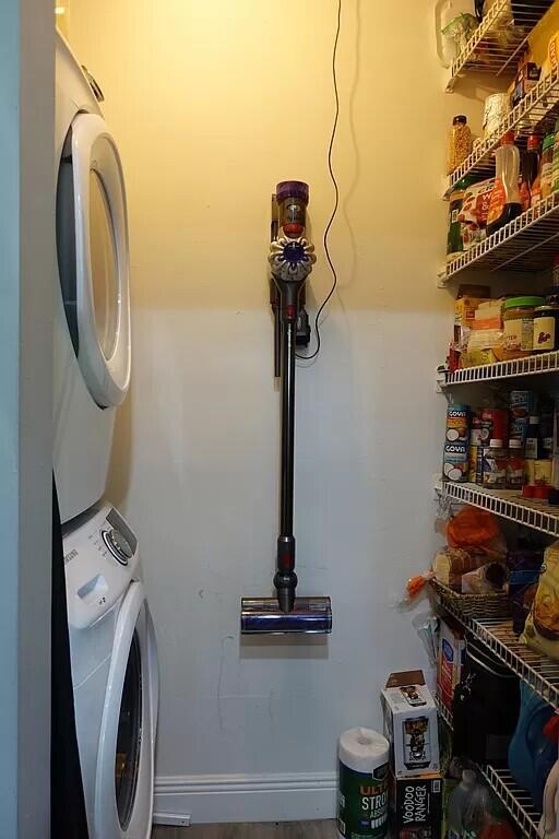 11720 Timbers Way Boca Raton, FL 33428 - Photo 8 of 19 a view of a storage and utility room with racks on the wall
