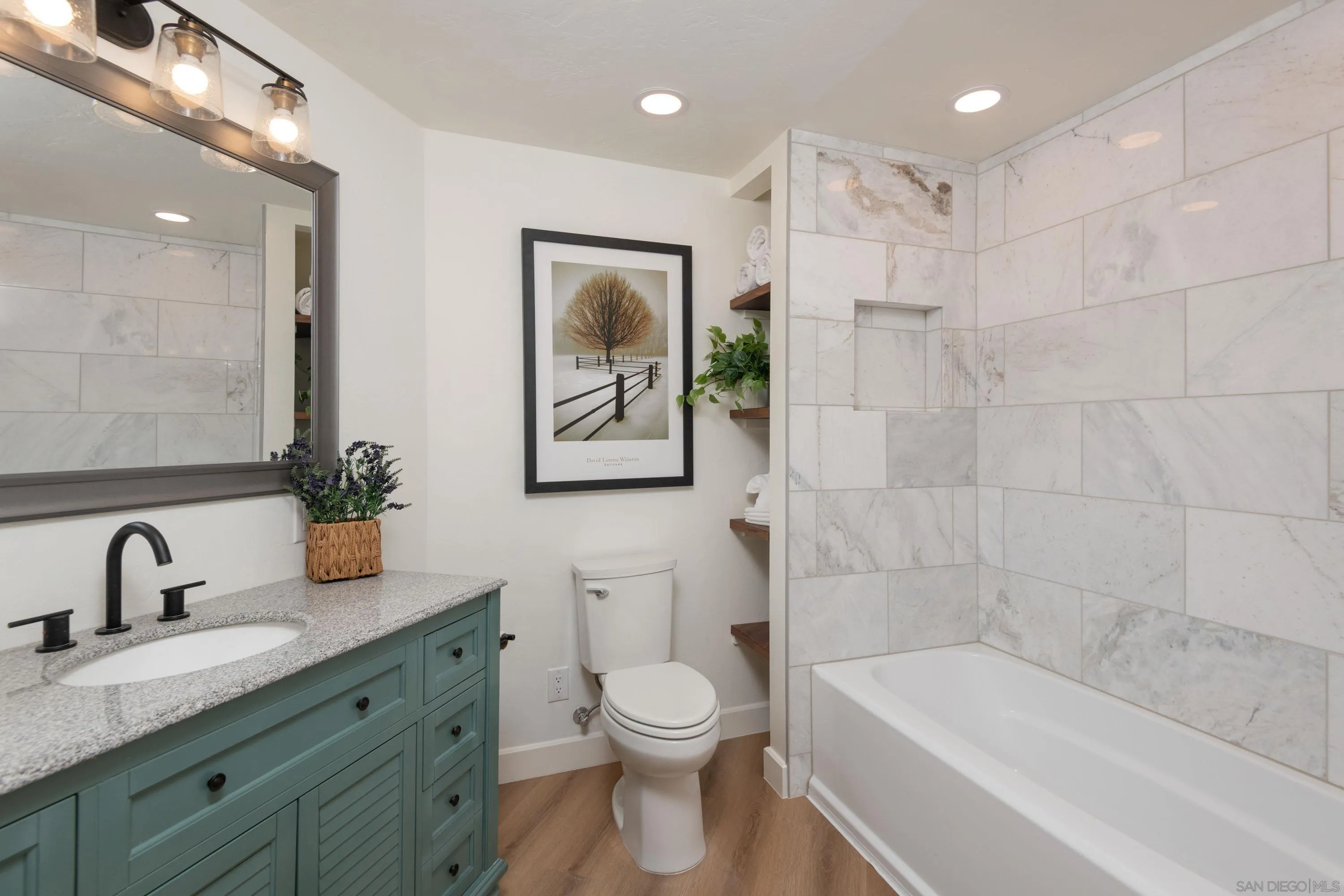 3413 Fern Meadow Road Palomar Mountain, CA 92060 - Photo 21 of 38 a bathroom with a toilet a sink a mirror a bathtub and shower