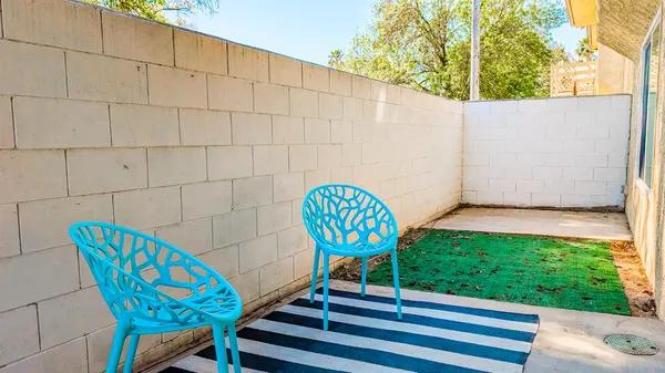 a view of a backyard with a tub