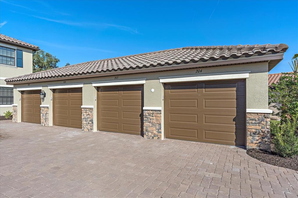 12410 Osorio Court, Unit 201 Sarasota, FL 34238 - Photo 21 of 42 front view of a house