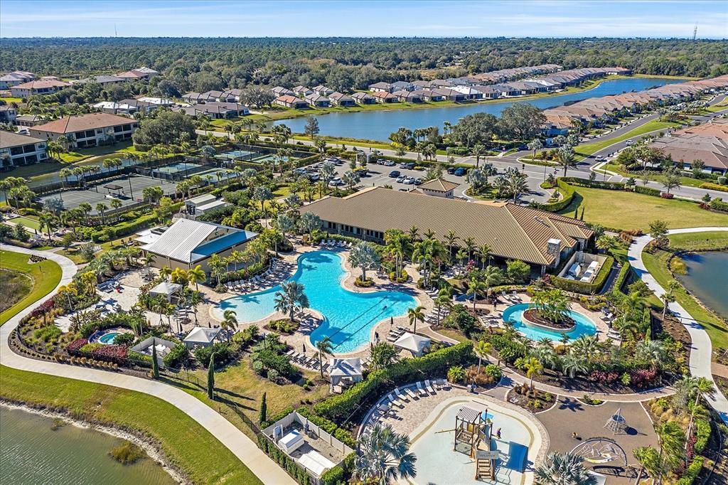 12410 Osorio Court, Unit 201 Sarasota, FL 34238 - Photo 38 of 42 an aerial view of residential houses with outdoor space