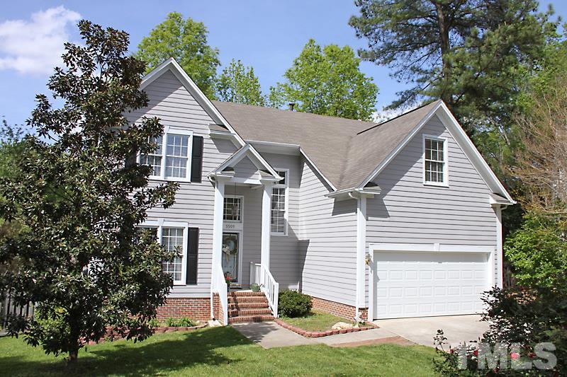 5501 Edgebury Road Raleigh, NC 27613 - Photo 1 of 14 front view of a house with a yard