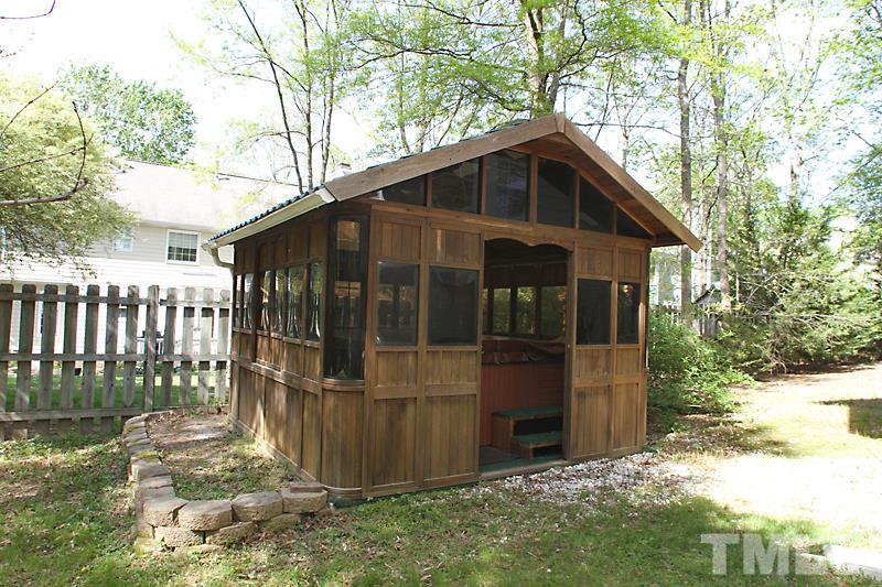 5501 Edgebury Road Raleigh, NC 27613 - Photo 12 of 14 a view of backyard of house with wooden fence
