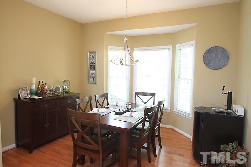 5501 Edgebury Road Raleigh, NC 27613 - Photo 4 of 14 a view of a dining room with furniture and window