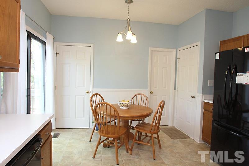 5501 Edgebury Road Raleigh, NC 27613 - Photo 6 of 14 a dining room with furniture and window