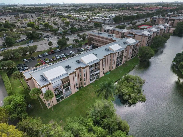 an aerial view of a house with a garden