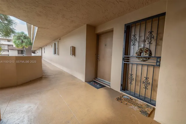 wooden floor and stairs in an empty room