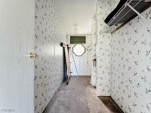 a bathroom with a shower and mirror