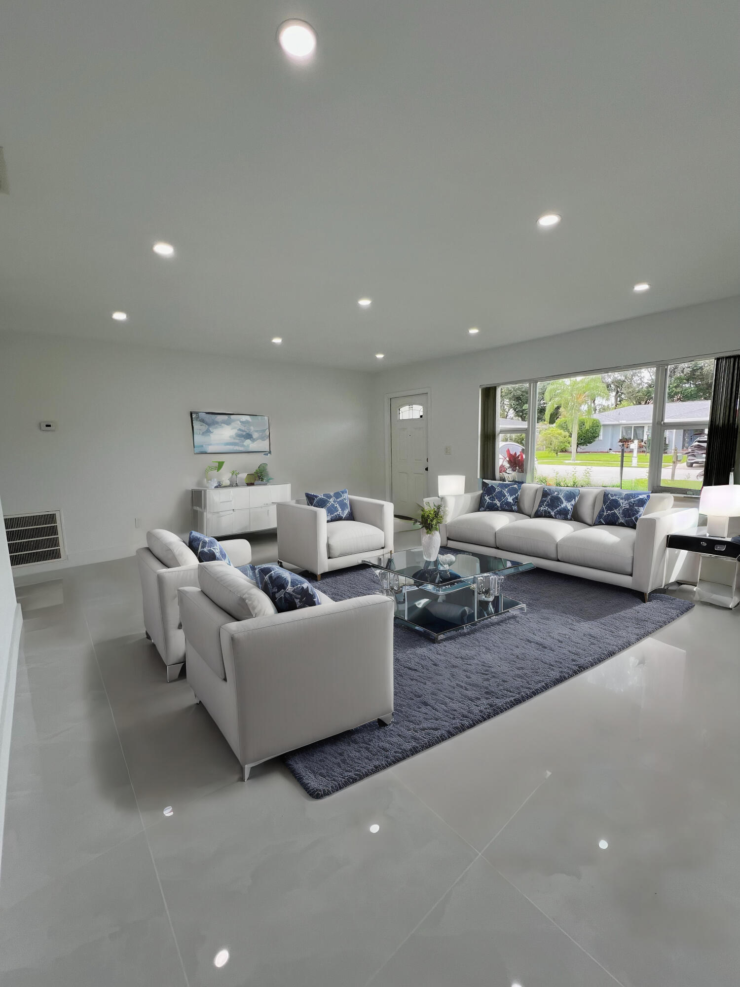 22575 Lanyard Street Boca Raton, FL 33428 - Photo 6 of 27 a living room with furniture and a large window