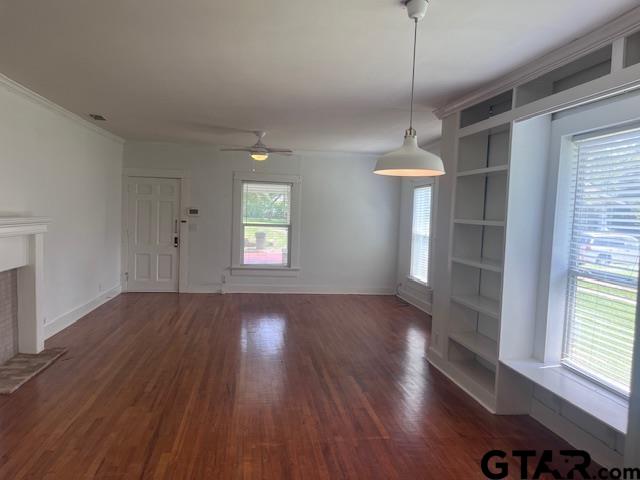 617 West Dobbs Street Tyler, TX 75701 - Photo 12 of 19 a view of a room with wooden floor and windows