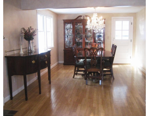 27 Gilbert Road Needham, MA 02492 - Photo 3 of 10 a view of a dining room with furniture window and wooden floor