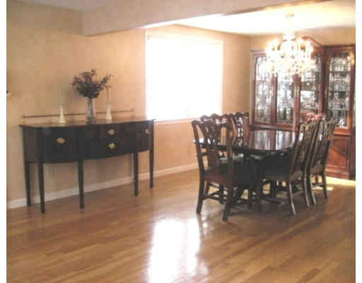 27 Gilbert Road Needham, MA 02492 - Photo 4 of 10 a view of a dining room with furniture window and wooden floor