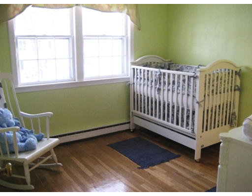 27 Gilbert Road Needham, MA 02492 - Photo 7 of 10 a view of a room with furniture and a window