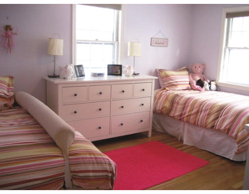 27 Gilbert Road Needham, MA 02492 - Photo 8 of 10 a bedroom with a bed and a window