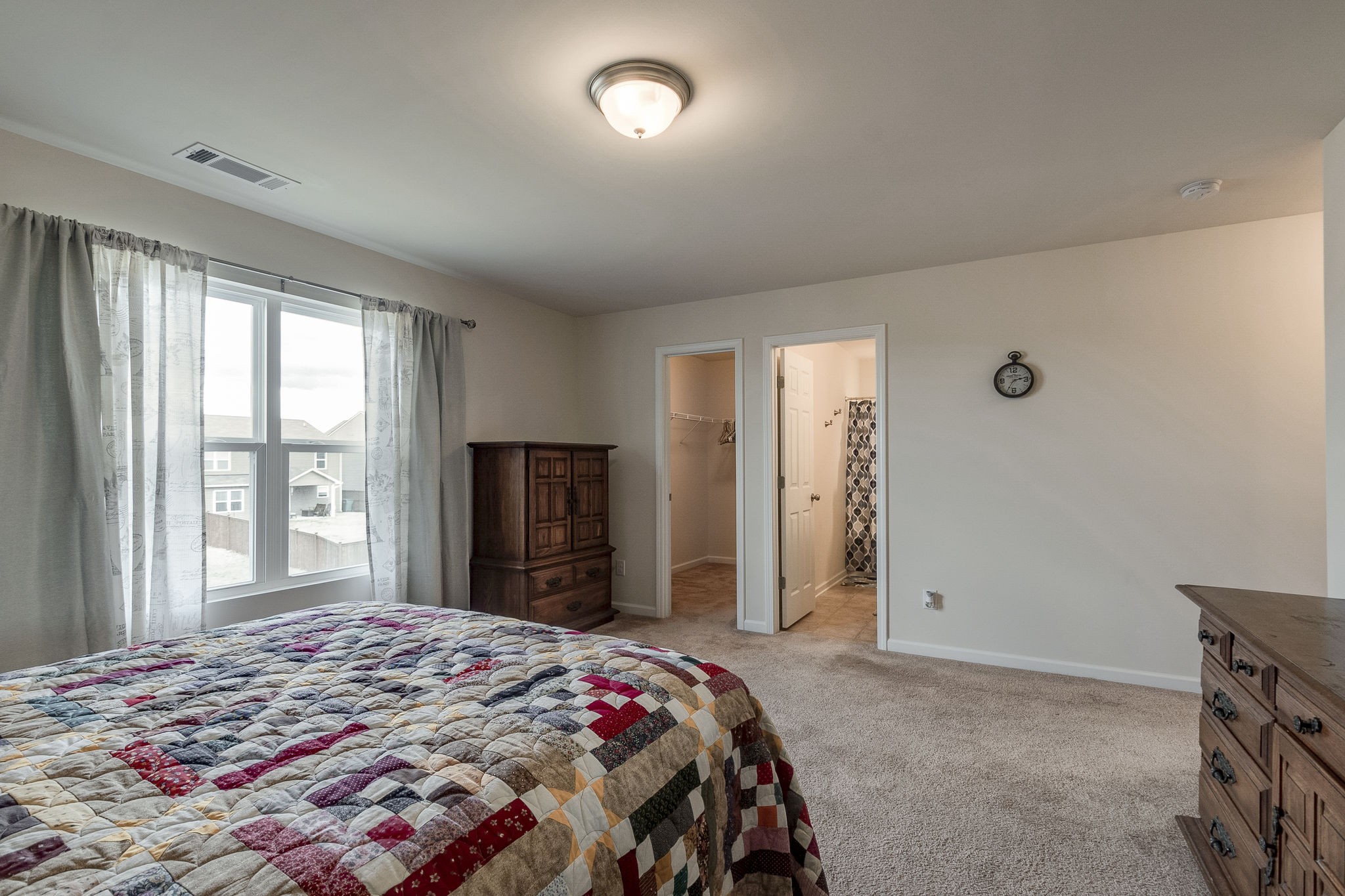 1425 Old Stone Road Lebanon, TN 37087 - Photo 15 of 24 a bedroom with a bed and a large window