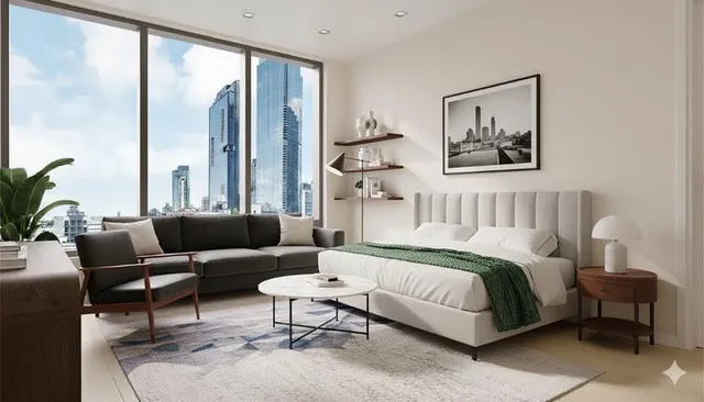 a spacious bedroom with a bed a couch and a large window