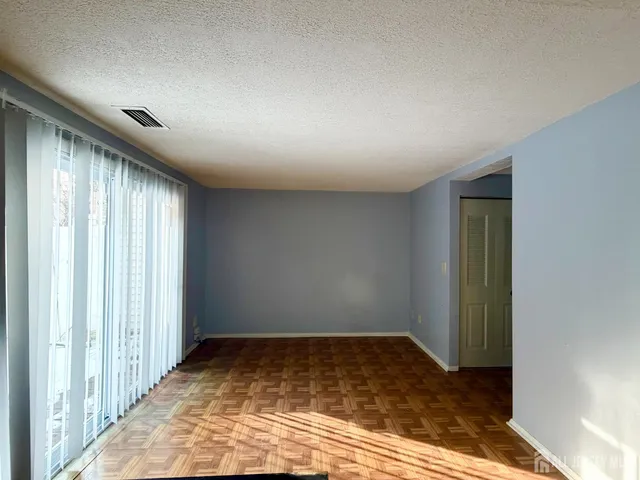 an empty room with a natural light