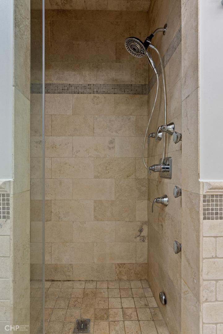 1049 West Monroe Street, Unit 1 Chicago, IL 60607 - Photo 14 of 22 a bathroom with a shower