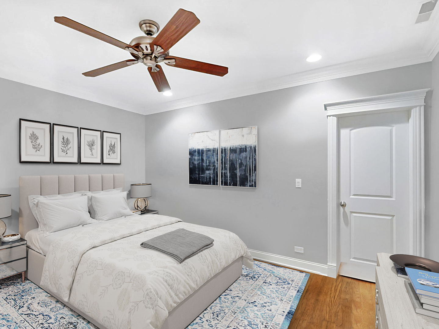1049 West Monroe Street, Unit 1 Chicago, IL 60607 - Photo 17 of 22 a bedroom with a bed and a chandelier