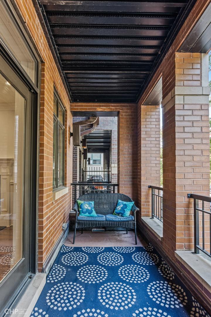1049 West Monroe Street, Unit 1 Chicago, IL 60607 - Photo 20 of 22 a view of two chairs in the balcony