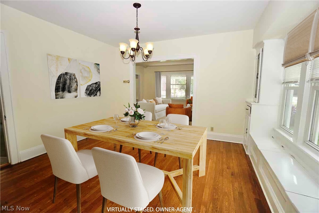 2168 Edgewood Road Cleveland, OH 44118 - Photo 4 of 41 1st fl dining room with an inviting chandelier and hardwood floors