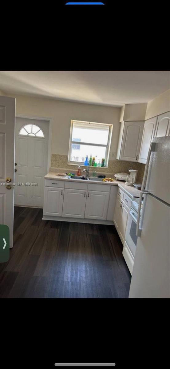 1843 Wiley Street, Unit 2 Hollywood, FL 33020 - Photo 2 of 15 a view of kitchen with wooden floor