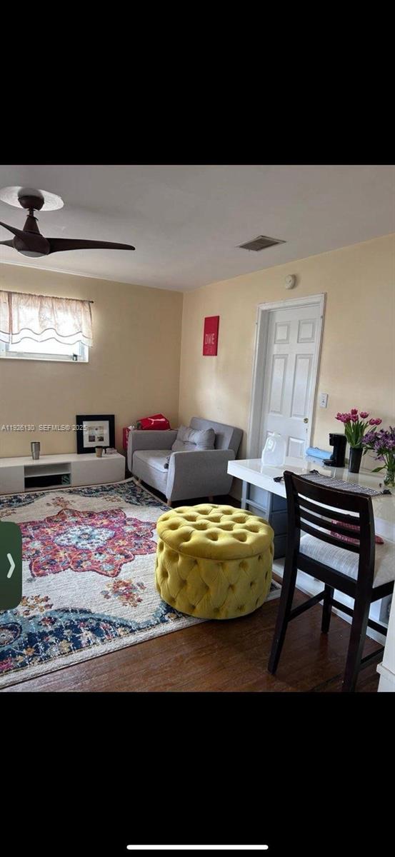 1843 Wiley Street, Unit 2 Hollywood, FL 33020 - Photo 4 of 15 a room with furniture and a rug