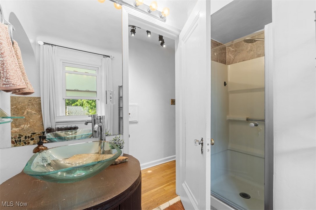 3609 Northcliffe Road University Heights, OH 44118 - Photo 15 of 26 Full bath featuring a shower stall, vanity, and wood finished floors
