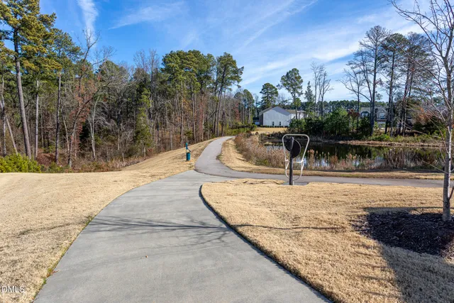 a view of swimming pool with a patio