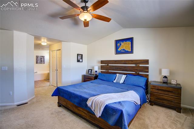 12118 Rio Secco Road Peyton, CO 80831 - Photo 17 of 34 Master bedroom with en-suite.