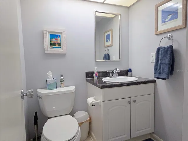 an aerial view of a house with outdoor space