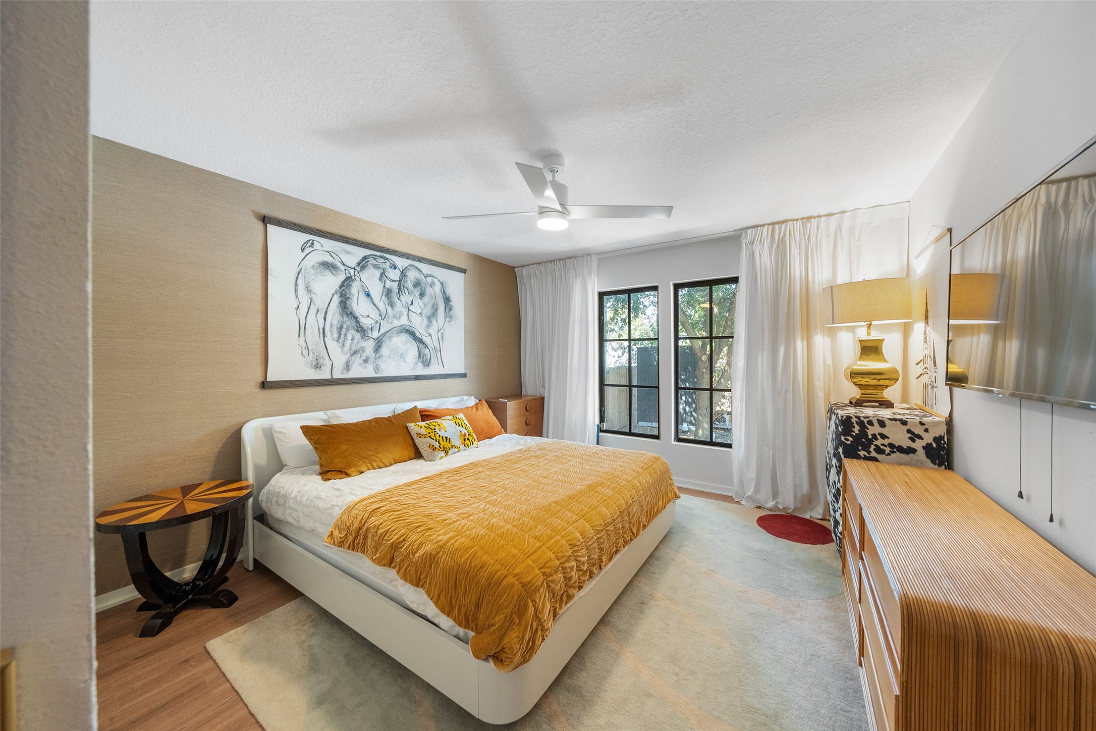 805 East 36th Street Houston, TX 77022 - Photo 16 of 28 a bedroom with a large bed couch and a window