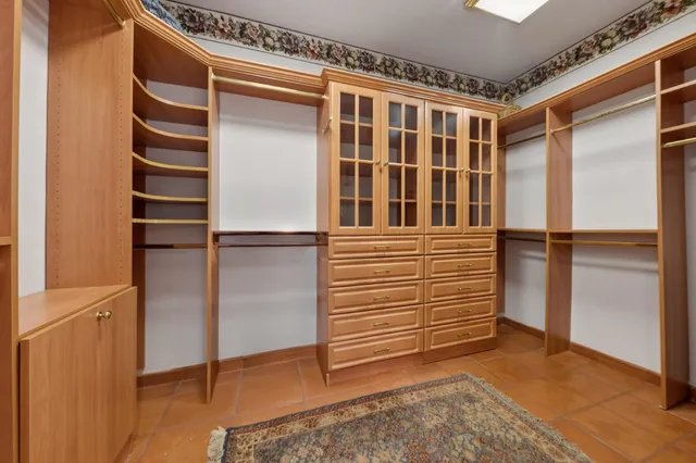 a bed room with a bed and a couch